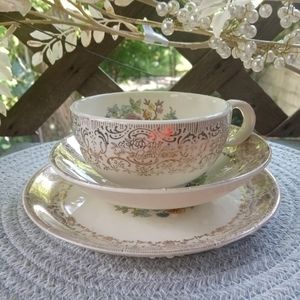 Set of three vintage tea cups, saucers, and sugar cube bowl